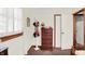 Bright bedroom featuring natural light, vintage-style dresser, and coat rack at 4770 Willow Rd, Zionsville, IN 46077
