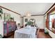 Spacious dining room featuring hardwood floors, natural light, and traditional decor at 4770 Willow Rd, Zionsville, IN 46077