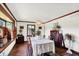Traditional dining room with wood floors, trim, and ample natural light at 4770 Willow Rd, Zionsville, IN 46077