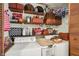 Organized laundry room featuring a washer, dryer, and ample storage space at 4770 Willow Rd, Zionsville, IN 46077