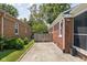 Backyard of brick home with fenced area and potential for outdoor living at 5126 Hillside Ave, Indianapolis, IN 46205