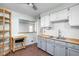 Charming kitchen with butcher block counters, shaker cabinets, and a stainless steel sink at 5126 Hillside Ave, Indianapolis, IN 46205