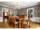 Traditional dining room with chandelier and hardwood floors at 5261 N Pennsylvania St, Indianapolis, IN 46220