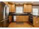 Modern kitchen featuring stainless appliances and ample counter space at 5261 N Pennsylvania St, Indianapolis, IN 46220