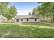 Large grassy backyard with a patio, privacy fence, and space for entertaining or relaxing outdoors at 5289 Pine Hill Dr, Noblesville, IN 46062