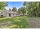 Spacious backyard featuring a well-maintained lawn and a privacy fence, great for outdoor activities at 5289 Pine Hill Dr, Noblesville, IN 46062