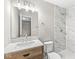 Updated bathroom featuring a new vanity, sink and stylish tiled shower and bathtub combination at 5289 Pine Hill Dr, Noblesville, IN 46062