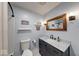 A full bathroom has new marble countertop and modern fixtures, creating a clean and bright space at 608 W 600 N, Fortville, IN 46040