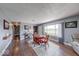 Bright dining area with hardwood floors, natural light, and charming decor at 608 W 600 N, Fortville, IN 46040