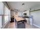 Well-lit kitchen with an island, ample counter space, and updated fixtures at 608 W 600 N, Fortville, IN 46040