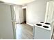 Kitchen with white stove and refrigerator at 613 N Tacoma Ave, Indianapolis, IN 46201