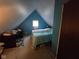 Attic bedroom with sloped walls, providing a cozy retreat at 627 Plum St, Noblesville, IN 46060