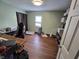Neutral bedroom with a window and space for a desk or storage at 627 Plum St, Noblesville, IN 46060