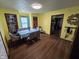 Bright dining room featuring hardwood floors and ample natural light at 627 Plum St, Noblesville, IN 46060