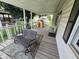 Spacious front porch with a bench, offering a welcoming entrance at 627 Plum St, Noblesville, IN 46060