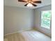 Bedroom featuring neutral walls, carpet, and a bright window at 6412 Cradle River Dr, Indianapolis, IN 46221