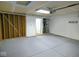 Spacious garage with concrete floors and ample lighting fixtures at 6412 Cradle River Dr, Indianapolis, IN 46221