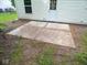 Concrete patio on the side of the home with a door leading inside at 6412 Cradle River Dr, Indianapolis, IN 46221