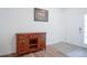 Cozy entryway featuring hardwood floors and a charming wooden cabinet with wine rack at 6608 W Shoreline Ct, Greenfield, IN 46140