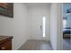 Inviting entryway with neutral tones and a view leading into a bedroom at 6608 W Shoreline Ct, Greenfield, IN 46140
