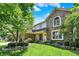 Inviting front exterior of home with manicured lawn and tasteful landscaping, showcasing curb appeal and charm at 664 N Scott Dr, Greenwood, IN 46142
