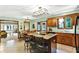 Spacious kitchen with a center island, granite countertops, and ample cabinet space at 664 N Scott Dr, Greenwood, IN 46142