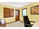 Office with a chair, carpet and a window with natural light at 664 N Scott Dr, Greenwood, IN 46142