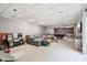 Spacious finished basement with a large sectional, play area, and a pool table at 7029 Kingswood Cir, Indianapolis, IN 46256