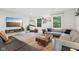 Spacious living room featuring light-filled windows and modern decor at 7029 Kingswood Cir, Indianapolis, IN 46256