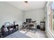 Functional home office space with desk, shelving, and natural light from a large window at 7029 Kingswood Cir, Indianapolis, IN 46256