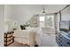 Bright bedroom featuring a comfortable bed, neutral walls, and plenty of natural light at 712 Orange St, Indianapolis, IN 46203