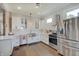 Well-appointed kitchen featuring white cabinets, subway tile backsplash, and stainless steel appliances at 712 Orange St, Indianapolis, IN 46203