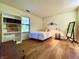 Bright bedroom with hardwood floors, a window view, and tasteful decor at 7392 S Meridian St, Indianapolis, IN 46217