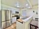 Modern kitchen with stainless steel appliances, white cabinets, and butcher block countertops at 7392 S Meridian St, Indianapolis, IN 46217
