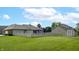Spacious backyard with a white picket fence and shed, perfect for outdoor activities and relaxation at 8028 Meadow Bend Ln, Indianapolis, IN 46259