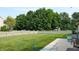 Large backyard with lush green grass, a fence, and plenty of space for recreation at 8028 Meadow Bend Ln, Indianapolis, IN 46259