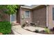 Cozy front porch with seating area and a welcoming entrance to the home at 8028 Meadow Bend Ln, Indianapolis, IN 46259