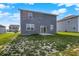 A backyard with green grass and a view of the neighborhood at 851 Sonoma Ln, Greenfield, IN 46140