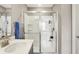 Modern bathroom showcasing a stylish sink and a spacious glass-enclosed shower with sleek fixtures at 851 Sonoma Ln, Greenfield, IN 46140