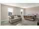Spacious bedroom with ample natural light, featuring a seating area and plush carpeting at 851 Sonoma Ln, Greenfield, IN 46140