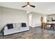 Spacious living room featuring modern gray tones and wood floors at 851 Sonoma Ln, Greenfield, IN 46140