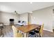Spacious living room featuring an adjacent dining area and comfortable seating at 851 Sonoma Ln, Greenfield, IN 46140