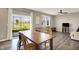 Open-concept living room with a view of the backyard pond at 851 Sonoma Ln, Greenfield, IN 46140