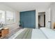 Stylish bedroom with built-in storage and light-filled window, creating a peaceful and organized space at 91 N Raceway Rd, Indianapolis, IN 46234