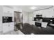Stylish kitchen boasts granite countertops, stainless steel appliances, and ample cabinet space at 91 N Raceway Rd, Indianapolis, IN 46234