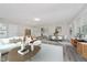 Open concept living room and dining area, great for entertaining and everyday living at 91 N Raceway Rd, Indianapolis, IN 46234