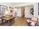 Bright living room featuring hardwood floors, accent wall decor, and lots of natural light at 921 Shadow Dr, Danville, IN 46122