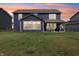 The home features a spacious backyard, perfect for outdoor activities, with a patio at 9671 Ridgecrest Ln, McCordsville, IN 46055