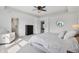 Bright main bedroom featuring neutral paint, walk-in closet, and natural light at 9671 Ridgecrest Ln, McCordsville, IN 46055