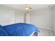 Bright bedroom featuring neutral paint, closet, and natural light at 9671 Ridgecrest Ln, McCordsville, IN 46055